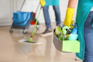 image of cleaners cleaning a house